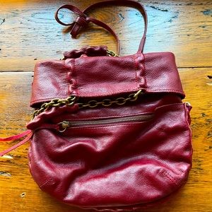 Like new burgundy Foley + Corinna leather purse.